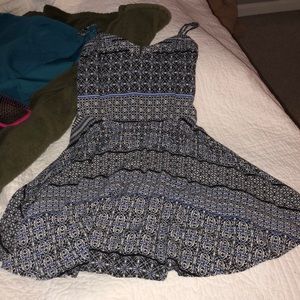 Flowy mini dress with black white and blue pattern